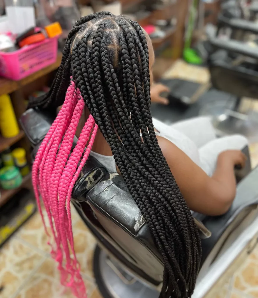 knotless braids with pink in the back